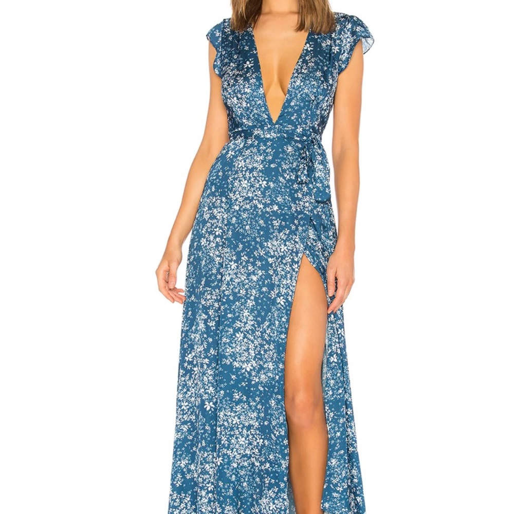 Tularosa Sid Wrap dress. Color: Alison Floral. Worn only for photos displayed